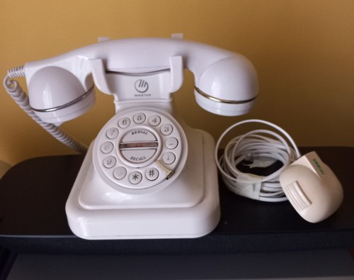Telefono vintage color crema - telefono, a
